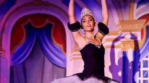 A ballet dancer performing on stage for the holiday production of The Nutcraker.