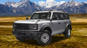 Silver Bronco with Mountain Background